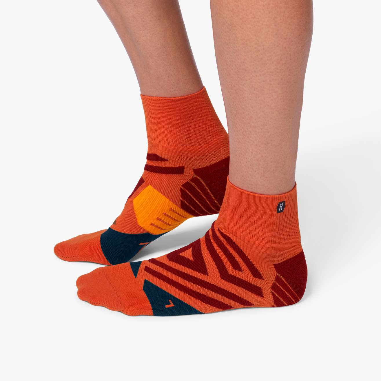 ON RUNNING MID SOCK RUST NAVY