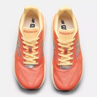 NEW BALANCE REBEL V5 TANGERINE HEAT ET SILVER METALLIC Chaussures de running pas cher
