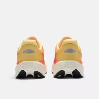 NEW BALANCE REBEL V5 TANGERINE HEAT ET SILVER METALLIC Chaussures de running pas cher